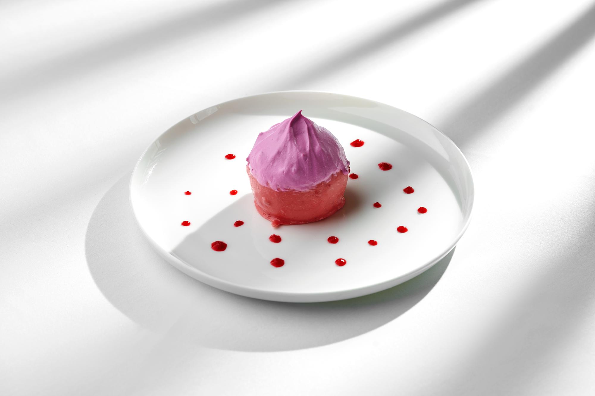 Closeup plated dessert with textured garnish