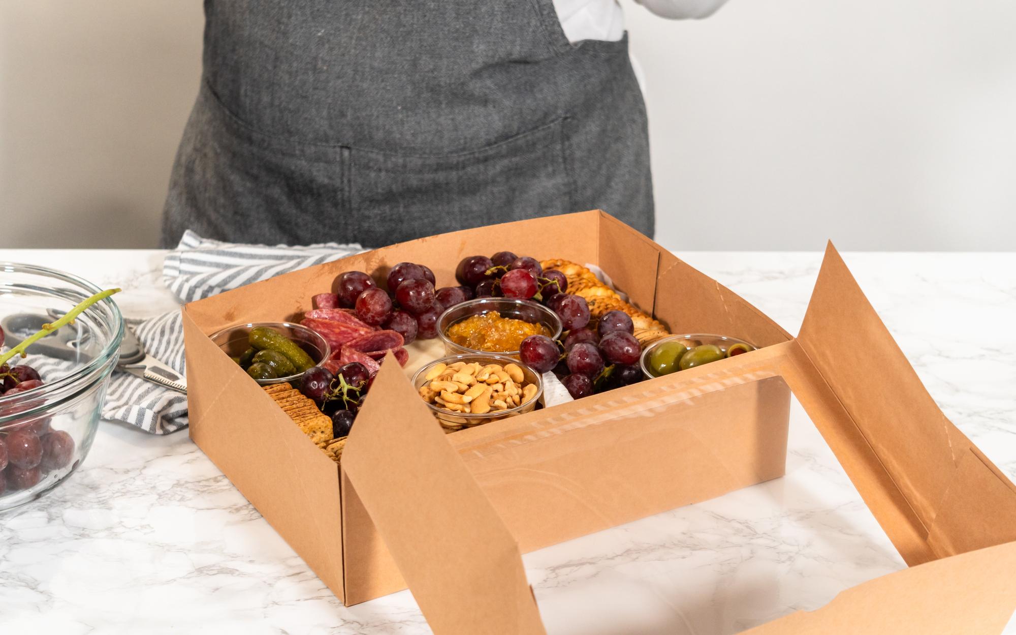 Stylish subscription box open on table